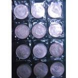 A folder of reproduction world coins