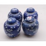 A matched set of four Chinese blue & white ginger jars in the Prunus pattern, height 15cm