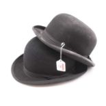 An Austin Reed of Regent Street, gentleman's bowler hat; together with another Locke & Co. St