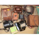 A box of various vintage camera equipment to include a Topcon RE2 camera (cased)