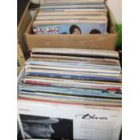 3934 Two boxes containing a large collection of vinyl LPs to include The Bay City Rollers, The