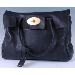 A Mulberry black leather Bayswater handbag, with brass 'postman's' lock and further hardware,