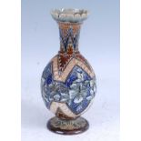 An 1884 Doulton Lambeth stoneware vase, the shaped rim above a globular body with incised chevron