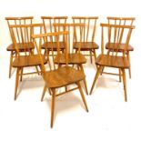 A set of eight 1960s Ercol light elm stickback kitchen chairs, each w.40cm