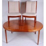 A 1960s teak dining suite by White & Newton Ltd, comprising; D-end extending dining table having a