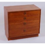 A 1970s G-Plan teak low chest of four long graduated drawers, with brass ringed pull handles, w.76.