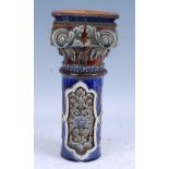 An 1884 Doulton Lambeth stoneware column, the voluted Corinthian capital with acanthus decoration