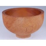 Charles Sharpe - a contemporary carved cedar circular footed fruit bowl, with unfinished exterior,