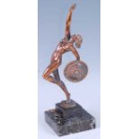 After Raymonde Guerbe (1894-1995) - a patinated cast metal model of a nude female warrior holding