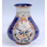 A 1907 Royal Doulton Lambeth stoneware vase, tube-line decorated with rhodedendrons, incised