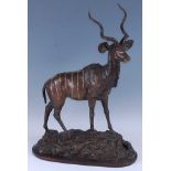 Robert Leggat (b.1963) - Standing Kudu, bronze with mid/dark patina, raised on naturalistic oval