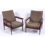 Guy Rogers - a pair of 1960s teak Manhattan armchairs, each with slightly shaped and curved arm