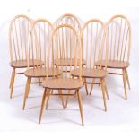 A set of six Ercol light elm stickback dining chairs, labelled verso, w.44cm