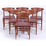 A set of six Danish 1960s teak bar back dining chairs, each with reupholstered tan leather fixed pad