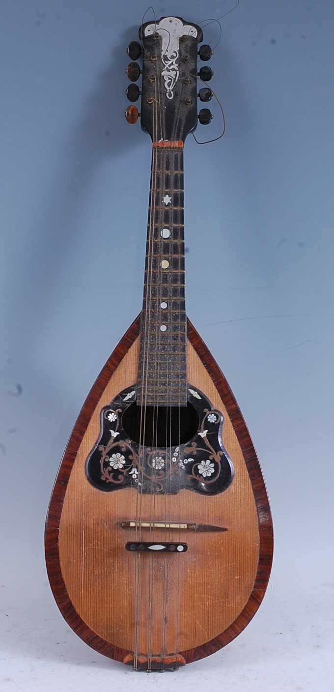 An early 20th Century Italian rosewood bowl back mandolin, having a mother of pearl inlaid