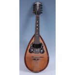An early 20th Century Italian rosewood bowl back mandolin, having a mother of pearl inlaid