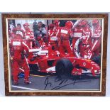 Formula 1, a collection of items to include a colour photograph of Michael Schumacher in Ferrari
