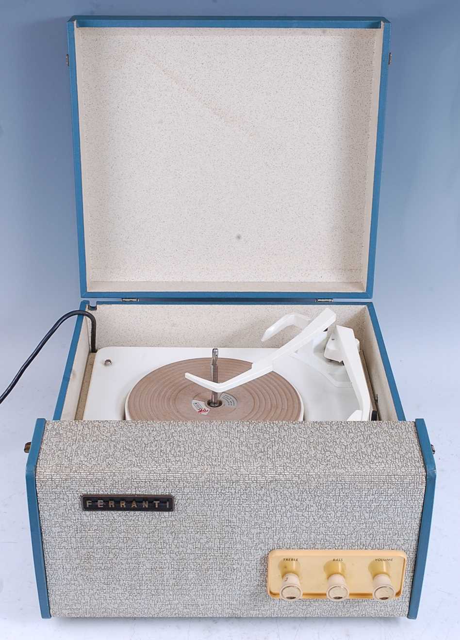 A 1960's Ferranti record player, having a Garrard turntable in a textured and blue rexine travel