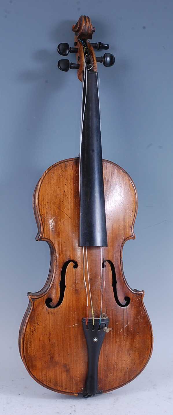 A 19th century violin, having a two piece maple back with spruce front, maple neck with ebony