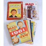 A collection of Mad magazines, the American humour magazine published from 1952 to include the First