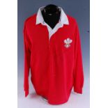 A Cotton Traders Classics replica Wales Rugby Union shirt, signed to the front Gareth Edwards, Phill