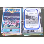 A large collection of match day programmes, to include 129 Wimbledon home and away for the promotion