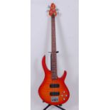 A Peavey International Series four string bass guitar, orange finish.