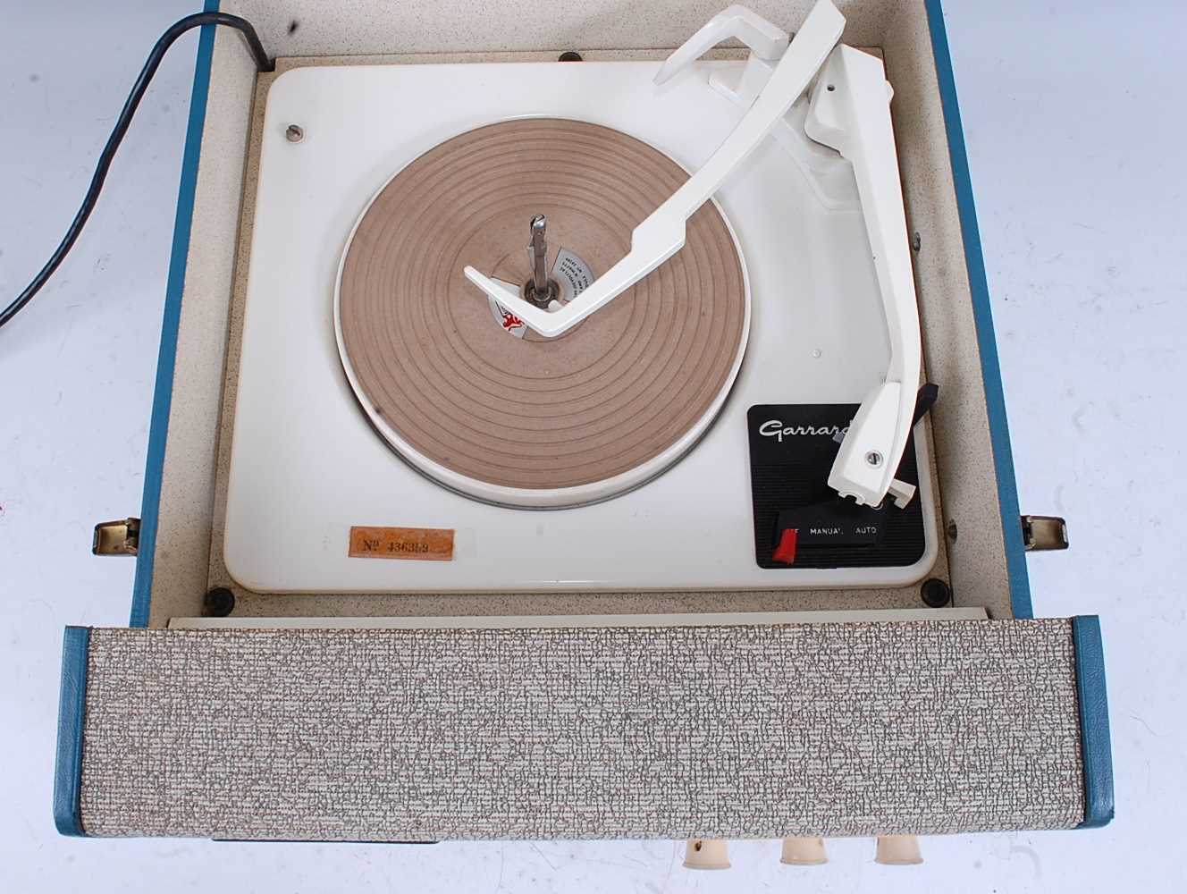 A 1960's Ferranti record player, having a Garrard turntable in a textured and blue rexine travel - Bild 2 aus 2