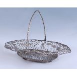 An early George III silver swing-handled basket, of shaped oval form with twist handle and edge,