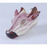 A circa 1800 Staffordshire creamware stirrup cup, in the form of a stag's head, decorated with