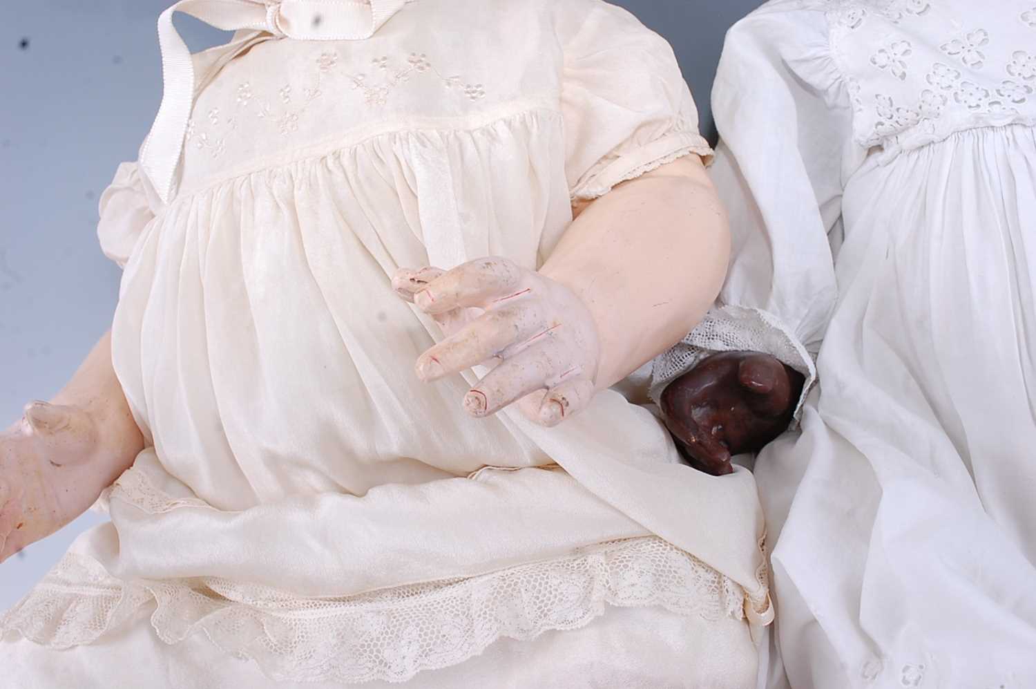 An early 20th century Ernst Heubach bisque headed doll, having sleeping brown glass eyes, open mouth - Image 7 of 12