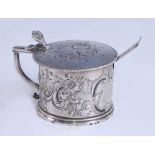 A William IV Irish silver lidded mustard, of circular form, later repousse decorated all over with