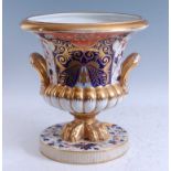 A large circa 1806-1825 Derby porcelain urn, of campagna form, decorated in the Imari palette,