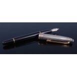 A Mont Blanc Meisterstuck fountain pen, having silver cap, 14ct yellow and white gold nib, stamped