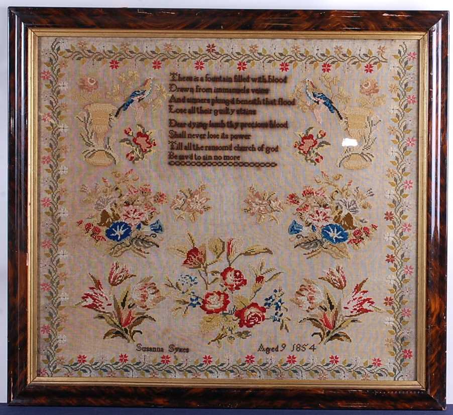 A mid-Victorian verse and picture needlework sampler by Susanna Sykes aged 9, dated 1854, 58 x 65cm,