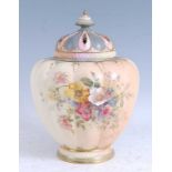 A large 1900 Royal Worcester porcelain jar and cover, of lobed form, decorated with spring