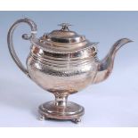 A George III silver pedestal teapot, having gadrooned borders and acanthus leaf capped handle with