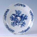 An 18th century Worcester porcelain cheese strainer, blue and white printed in the pinecone pattern,