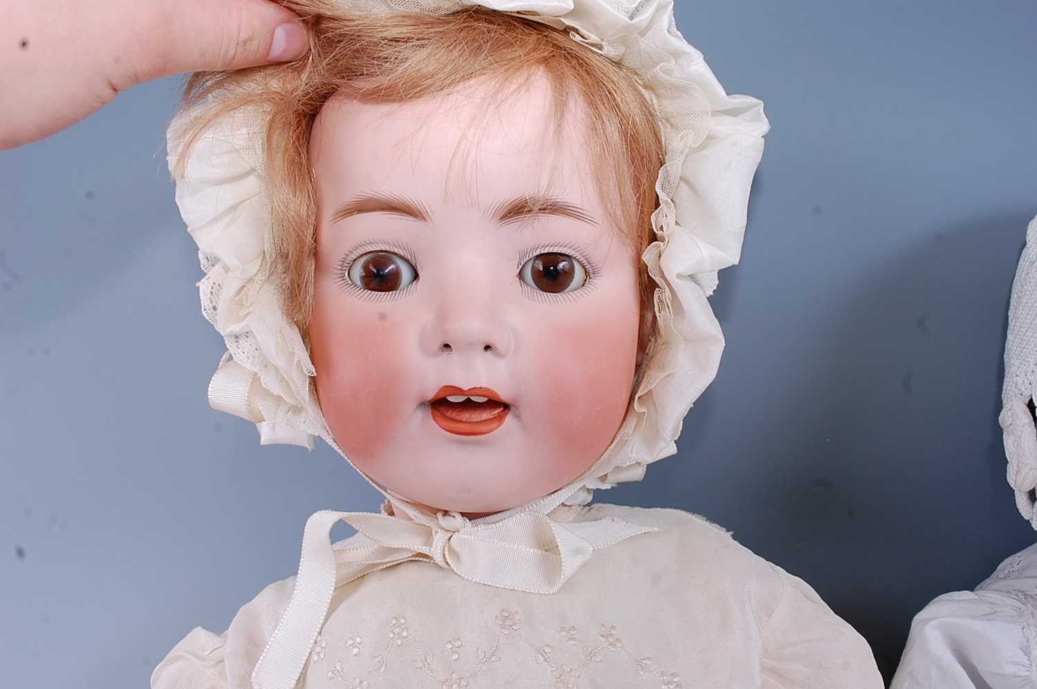 An early 20th century Ernst Heubach bisque headed doll, having sleeping brown glass eyes, open mouth - Image 9 of 12