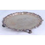 A modern silver salver by Garrard & Co, having a shell cast piecrust rim, presentation engraving