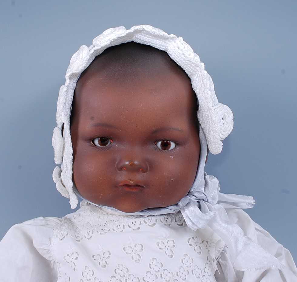 An early 20th century Ernst Heubach bisque headed doll, having sleeping brown glass eyes, open mouth - Image 6 of 12