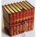 A Huntley & Palmer lithograph printed biscuit tin, in the form of eight bound books, w.16cm