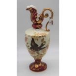 A Victorian pottery ewer, decorated with a bird amongst flowers, height 41cmCondition report: Finely