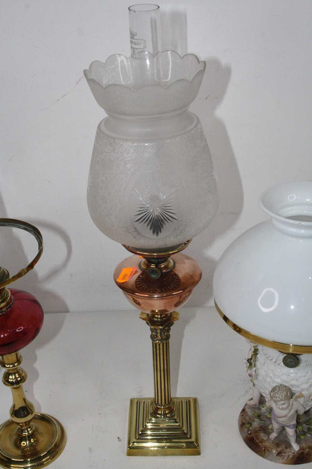 Please not that the porcelain lamp is also missing its shade - A 19th century brass and copper oil - Image 10 of 11