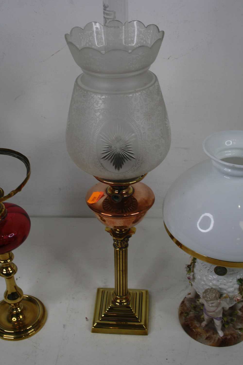 Please not that the porcelain lamp is also missing its shade - A 19th century brass and copper oil - Image 6 of 11