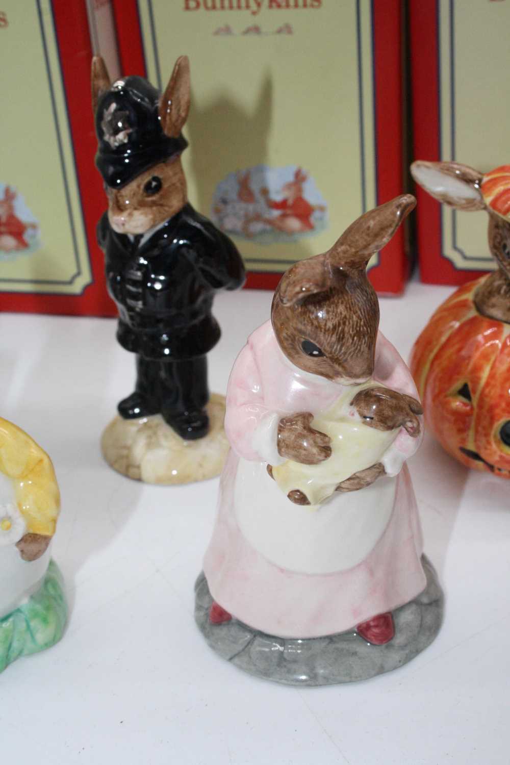 A collection of Royal Doulton Bunnykins figures to include Choir Singer, and Fireman, the largest - Image 4 of 7