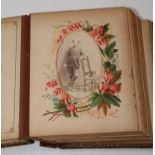 A Victorian leather bound photograph album, the contents mainly being family portraitsCondition