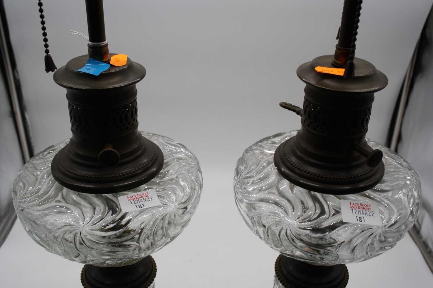 A pair of converted pressed glass oil lamps, each mounted upon a polished hardstone plinth, height - Image 6 of 7