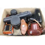A box of assorted cameras and accessories, to include Praktica LLC, Canon etcCondition report: See