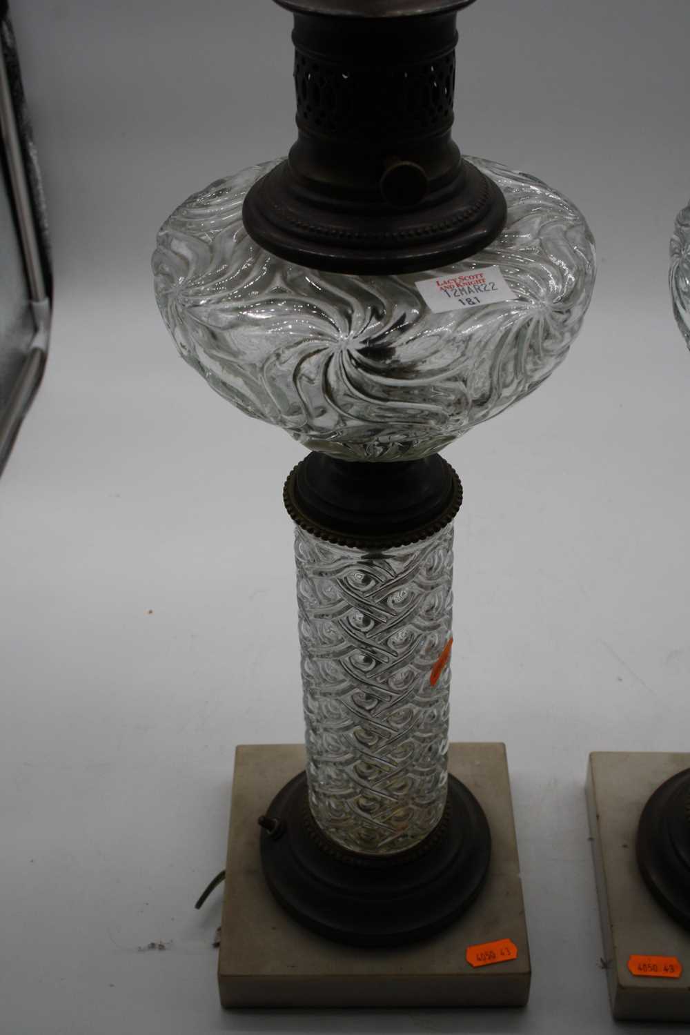 A pair of converted pressed glass oil lamps, each mounted upon a polished hardstone plinth, height - Image 4 of 7